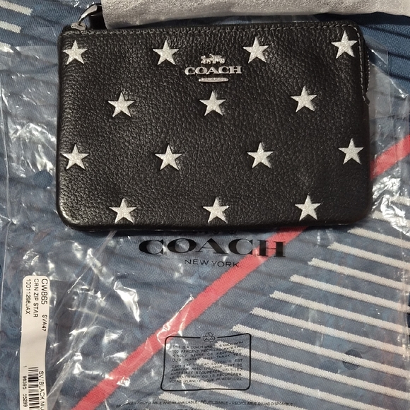 Coach Handbags - Coach Black Pouch with White Star Design